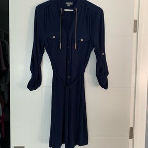 Navy blue dress , Roz & Ali. Snap front, jersey, front pockets